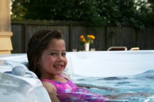 little girl in hot tub