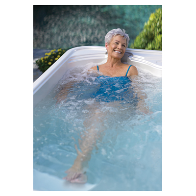 older woman in hot tub