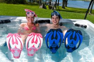 couple in hot tub with snorkeling gear