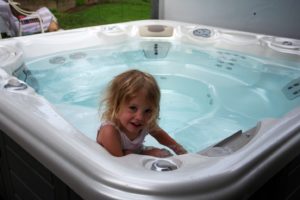 little girl in hot tub