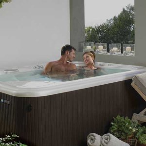 couple in in-door hot tub