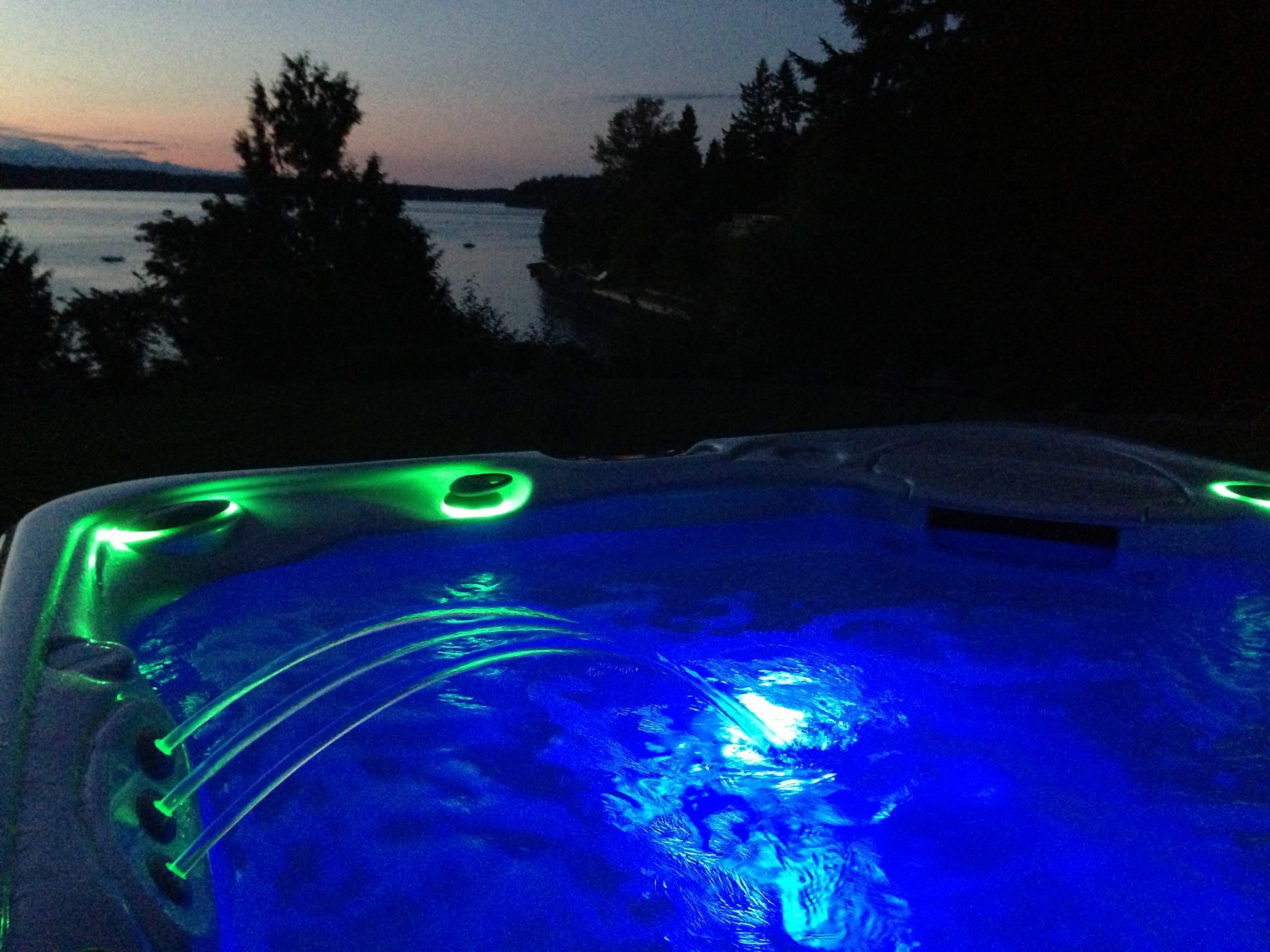 lighted hot tub at sunset