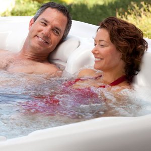 couple relaxed in hot tub