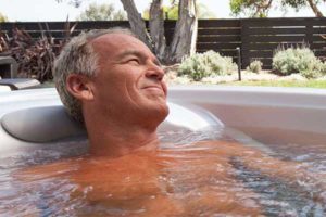 older man in hot tub