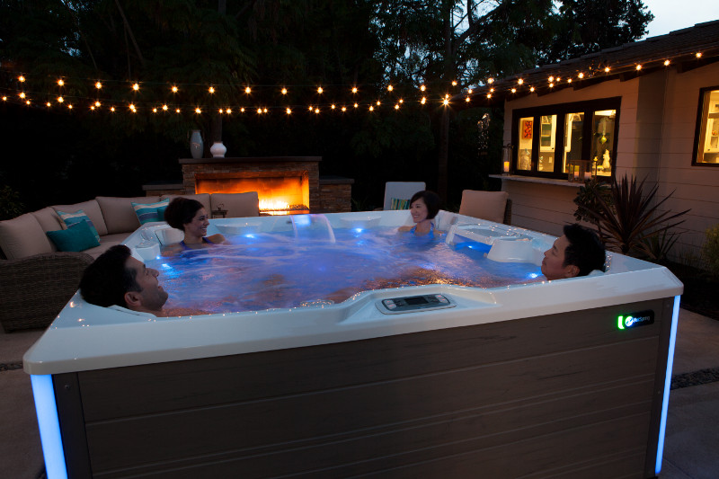 4 people in a hot tub