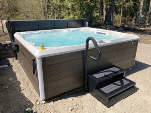 A HotSpring prism hot tub in a customer's yard in Redmond.