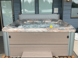 A HotSpring Rhythm hot tub on an Olympic Hot Tub customer's property in Bonney Lake, Washington.